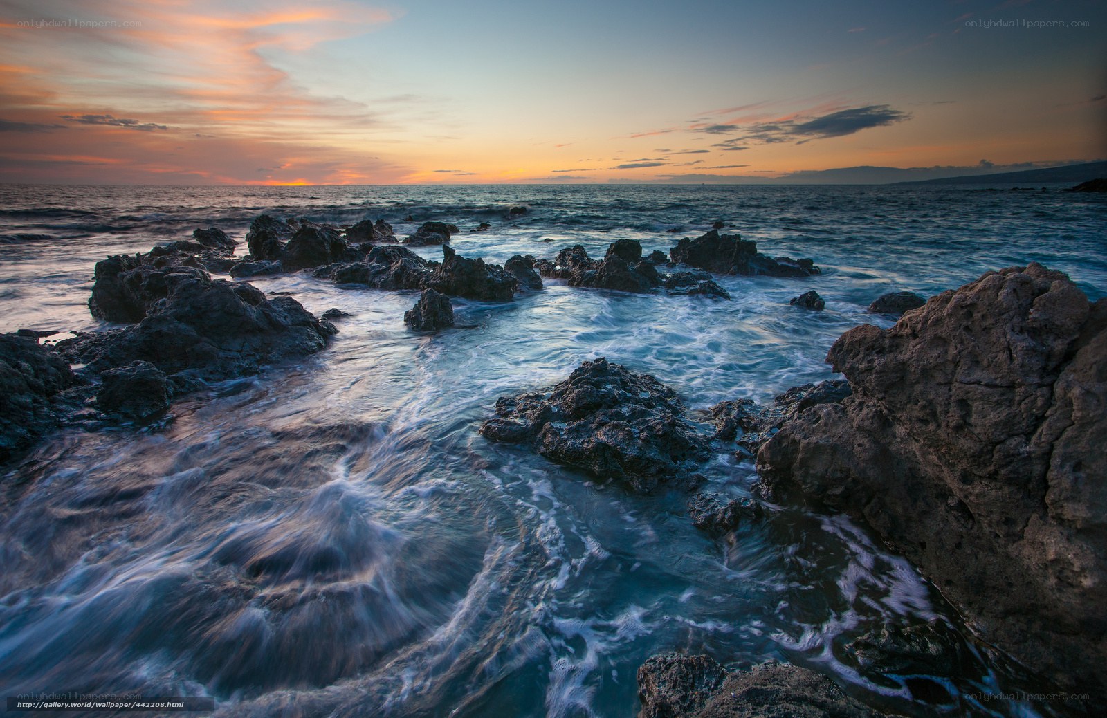 Ocean waves at sunset