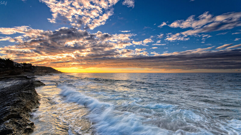 Ocean Waves at Sunset — Blue, Dramatic, Photograph, Clouds, Coastline