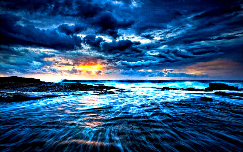 Ocean Waves at Sunset — Blue, Dramatic, Photograph, Clouds, Rocks, Sun