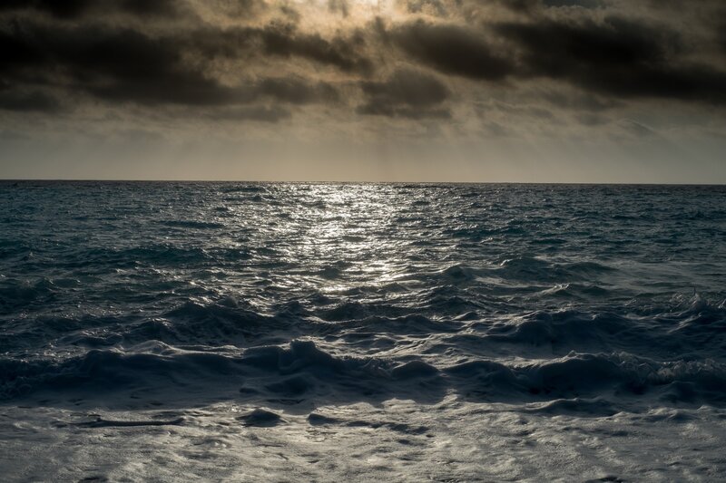 Ocean Waves at Sunset — Blue, Dramatic, Photograph, Clouds, Sunlight, Foam