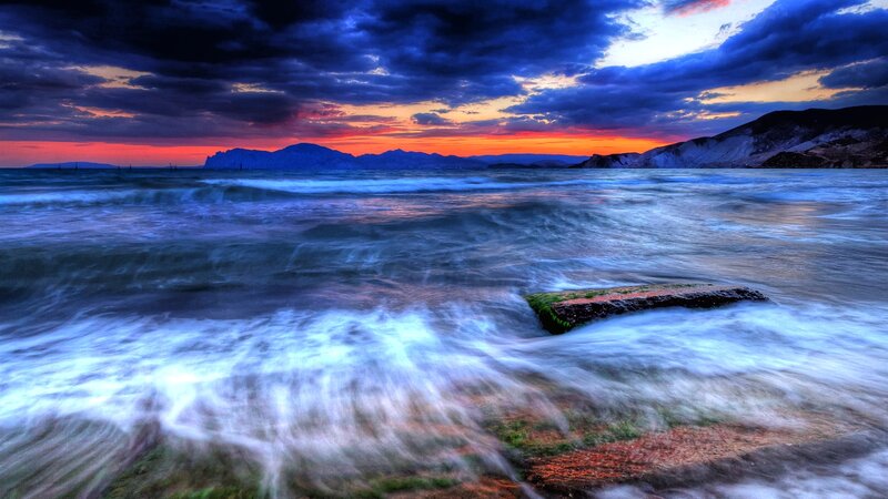 Ocean Waves at Sunset — Blue, Dramatic, Photograph, Mountains, Clouds
