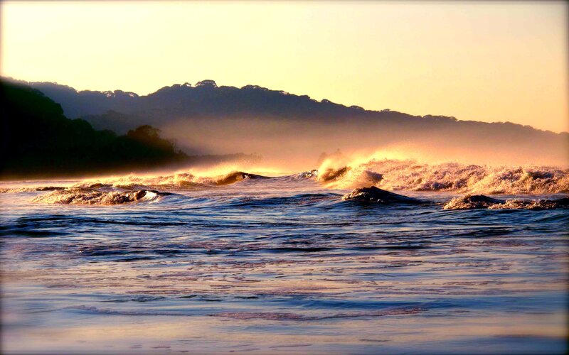 Ocean Waves at Sunset — Blue, Dramatic, Photograph, Mountains, Sea Spray