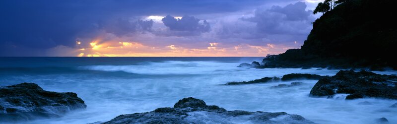 Ocean Waves at Sunset — Blue, Dramatic, Photograph, Rocks, Clouds, Sun, Purple