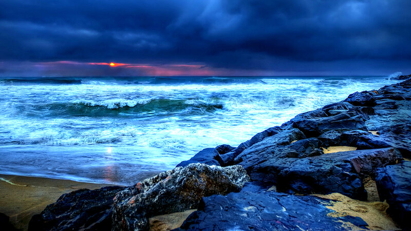 Ocean Waves at Sunset — Blue, Dramatic, Photograph, Rocks, Sand