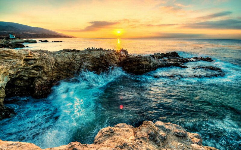 Ocean Waves at Sunset — Blue, Dramatic, Photograph, Rocks, Sun, Birds