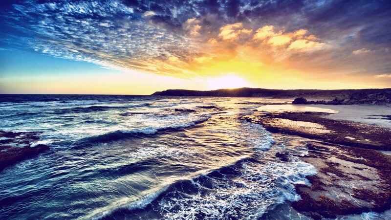 Ocean Waves at Sunset — Blue, Dramatic, Photograph, Sky, Clouds, Coastline, Yellow