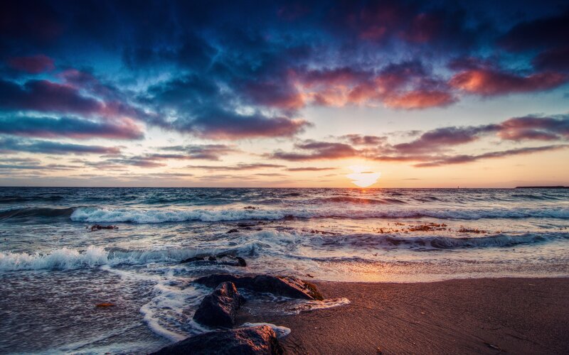 Ocean Waves at Sunset — Blue, Dramatic, Photograph, Sun, Clouds, Rocks, Beach