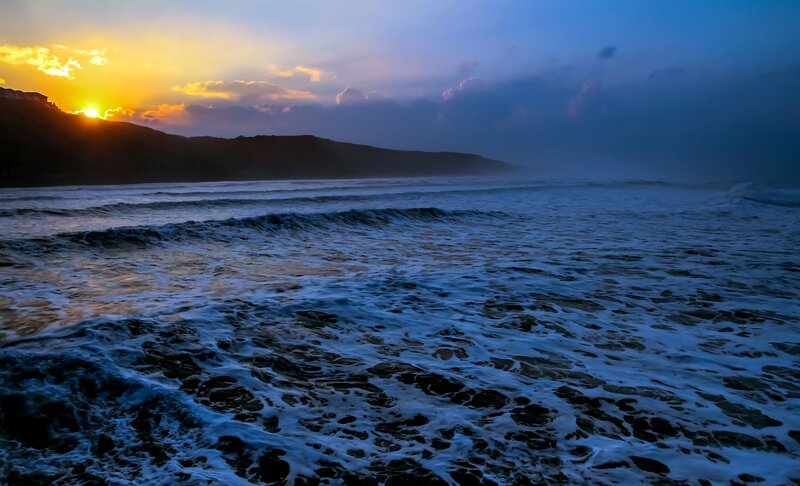 Ocean Waves at Sunset — Blue, Dramatic, Photograph, Sun, Mountain