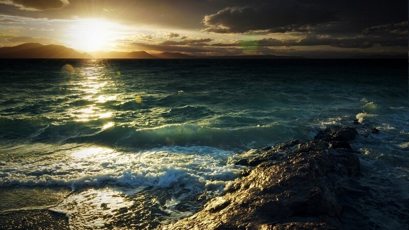 Ocean Waves at Sunset — Blue, Dramatic, Photograph, Sun, Mountains, Rocks