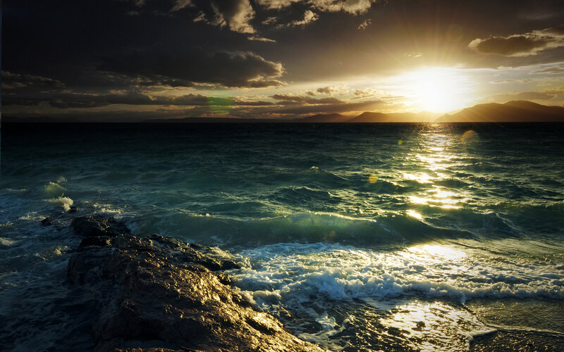 Ocean Waves at Sunset — Blue, Dramatic, Photograph, Sun, Mountains