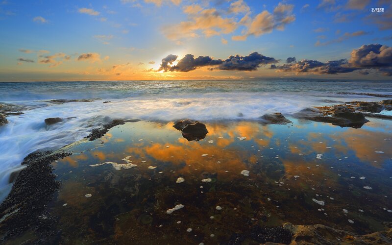 Ocean Waves at Sunset — Blue, Serene, Photograph, Clouds, Rocks