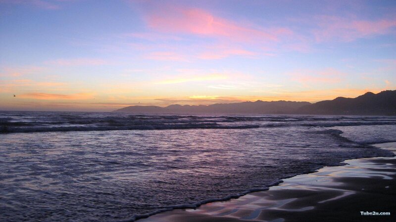 Ocean Waves at Sunset — Blue, Serene, Photograph, Mountains, Sky, Beach, Pink