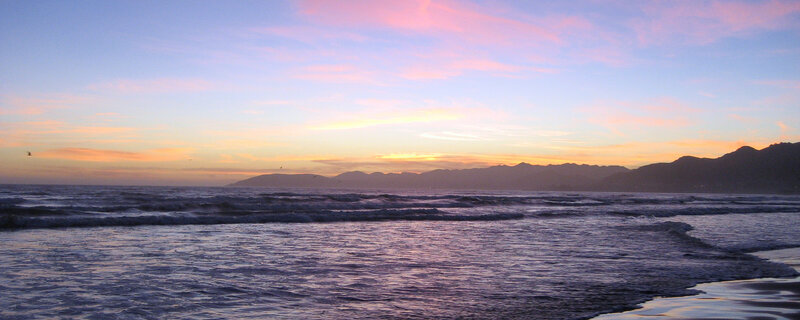 Ocean Waves at Sunset — Blue, Serene, Photograph, Mountains, Sky, Birds, Pink