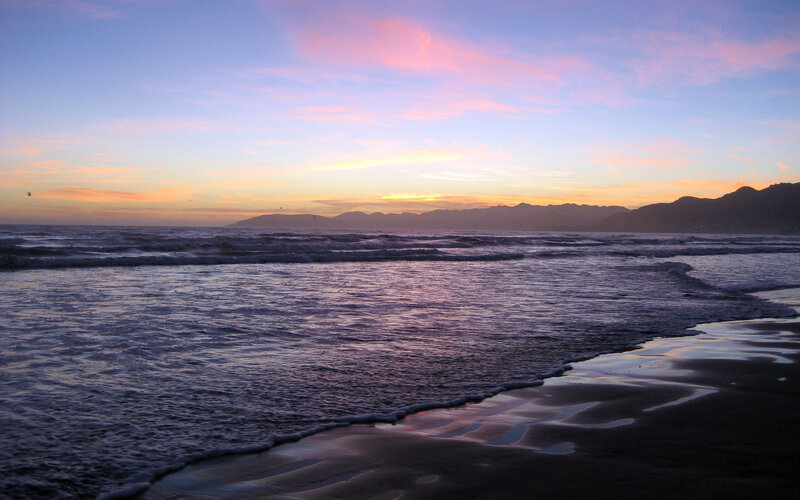 Ocean Waves at Sunset — Blue, Serene, Photograph, Mountains