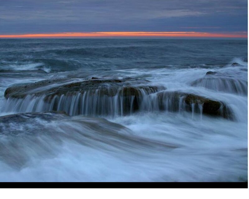 Ocean Waves at Sunset — Blue, Serene, Photograph, Rocks, Sky