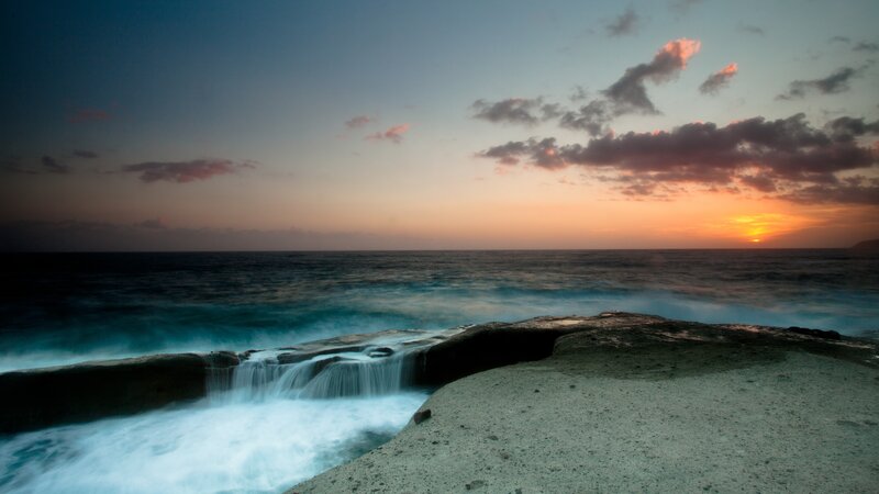 Ocean Waves at Sunset — Blue, Serene, Photograph, Sky, Rocks