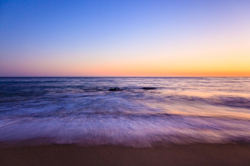 Ocean Waves at Sunset — Blue, Serene, Photograph, Sky, Sand, Rocks