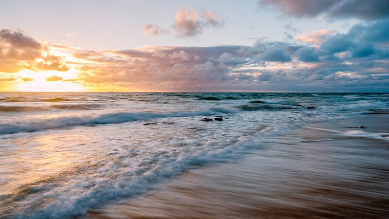 Ocean Waves at Sunset — Blue, Serene, Photograph, Sun, Clouds, Beach, Rocks