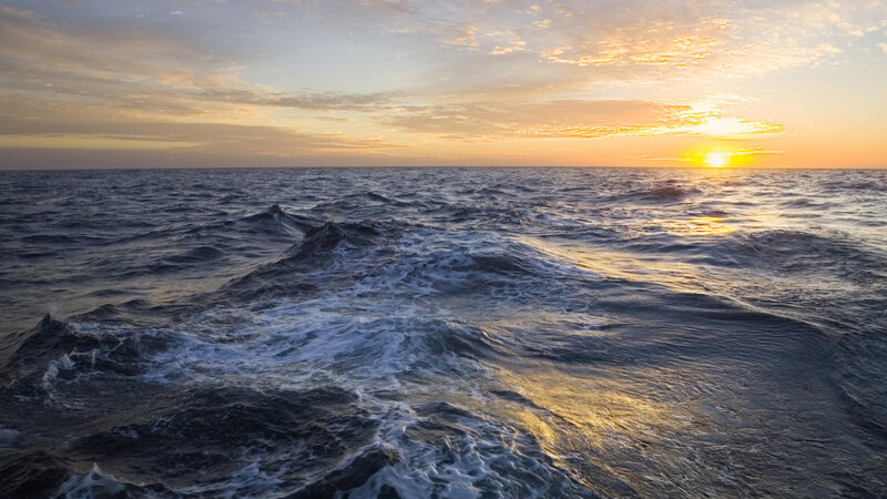 Ocean Waves at Sunset — Blue, Serene, Photograph