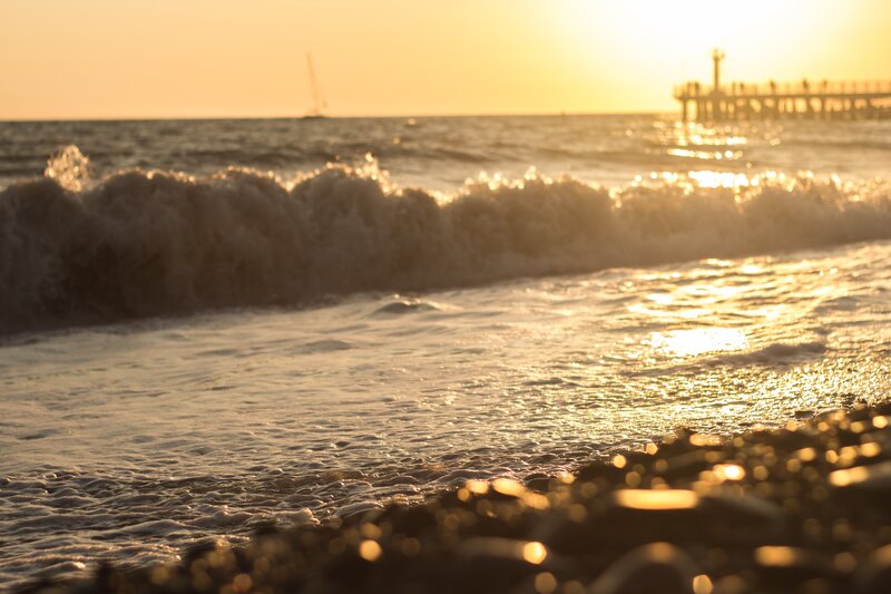 Ocean Waves at Sunset — Gold, Serene, Photograph, Pier