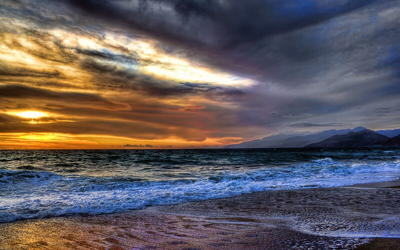 Ocean Waves at Sunset — Orange, Dramatic, Photograph, Clouds, Mountains