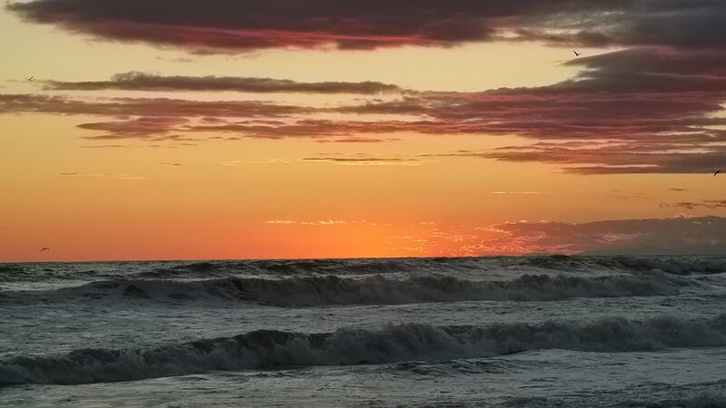 Ocean Waves at Sunset — Orange, Dramatic, Photograph, Sky, Clouds, Birds