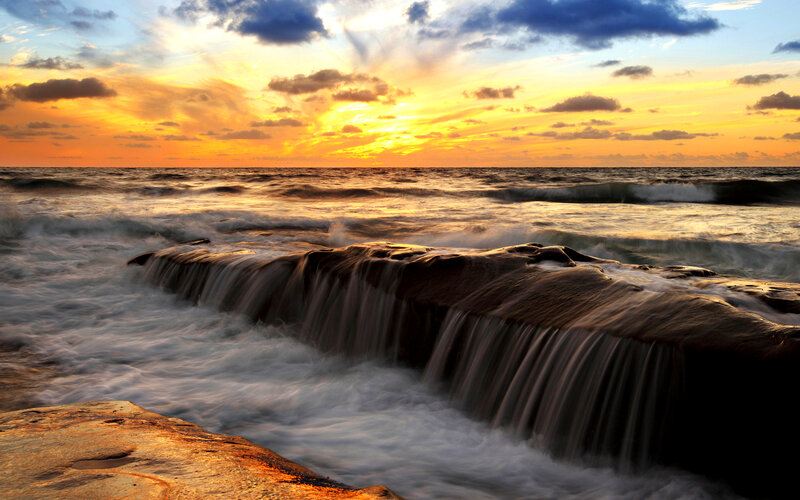 Ocean Waves at Sunset — Orange, Dramatic, Photograph, Sky, Clouds, Rocks