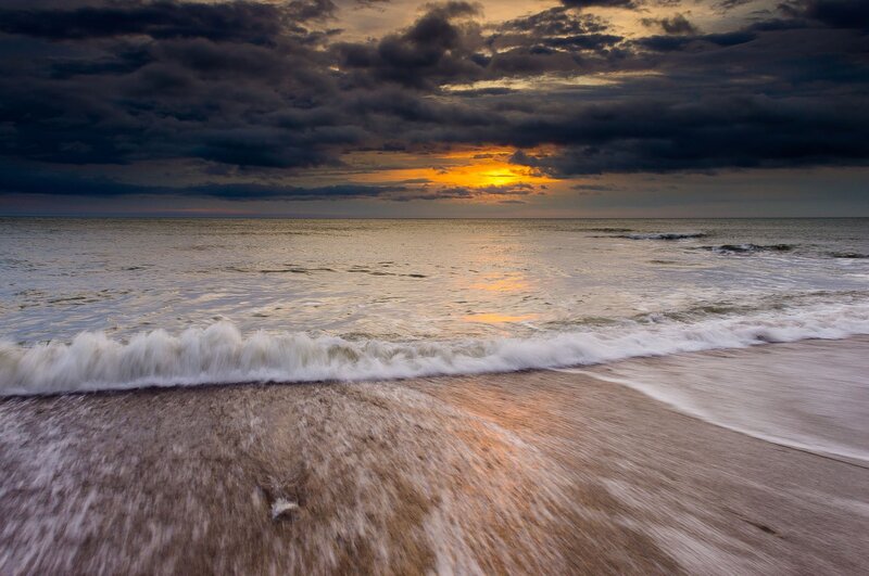 Ocean Waves at Sunset — Orange, Dramatic, Photograph, Sun, Clouds, Beach, Gray