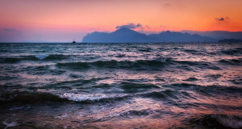 Ocean Waves at Sunset — Orange, Serene, Photograph, Mountains