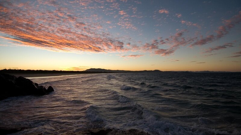 Ocean Waves at Sunset — Orange, Serene, Photograph, Sky, Mountains