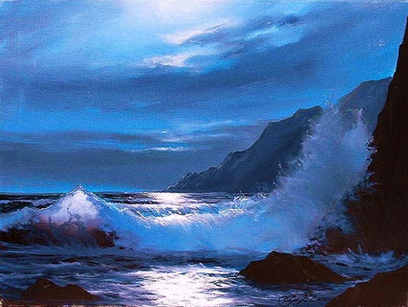 Ocean waves crashing at night