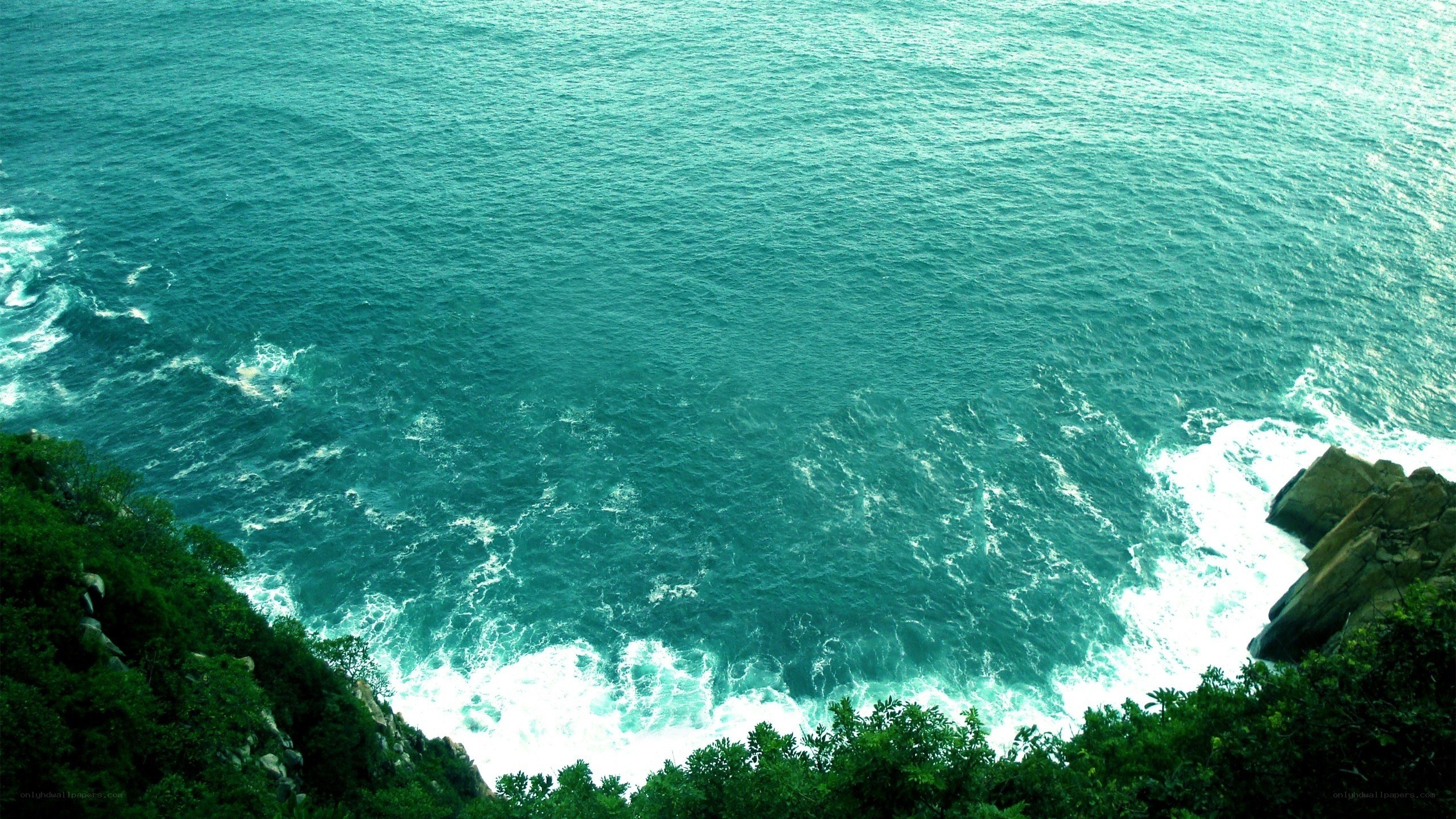 ocean waves crashing on cliffs