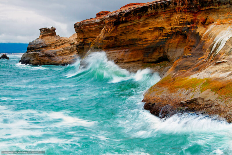 Ocean waves crashing on cliffs