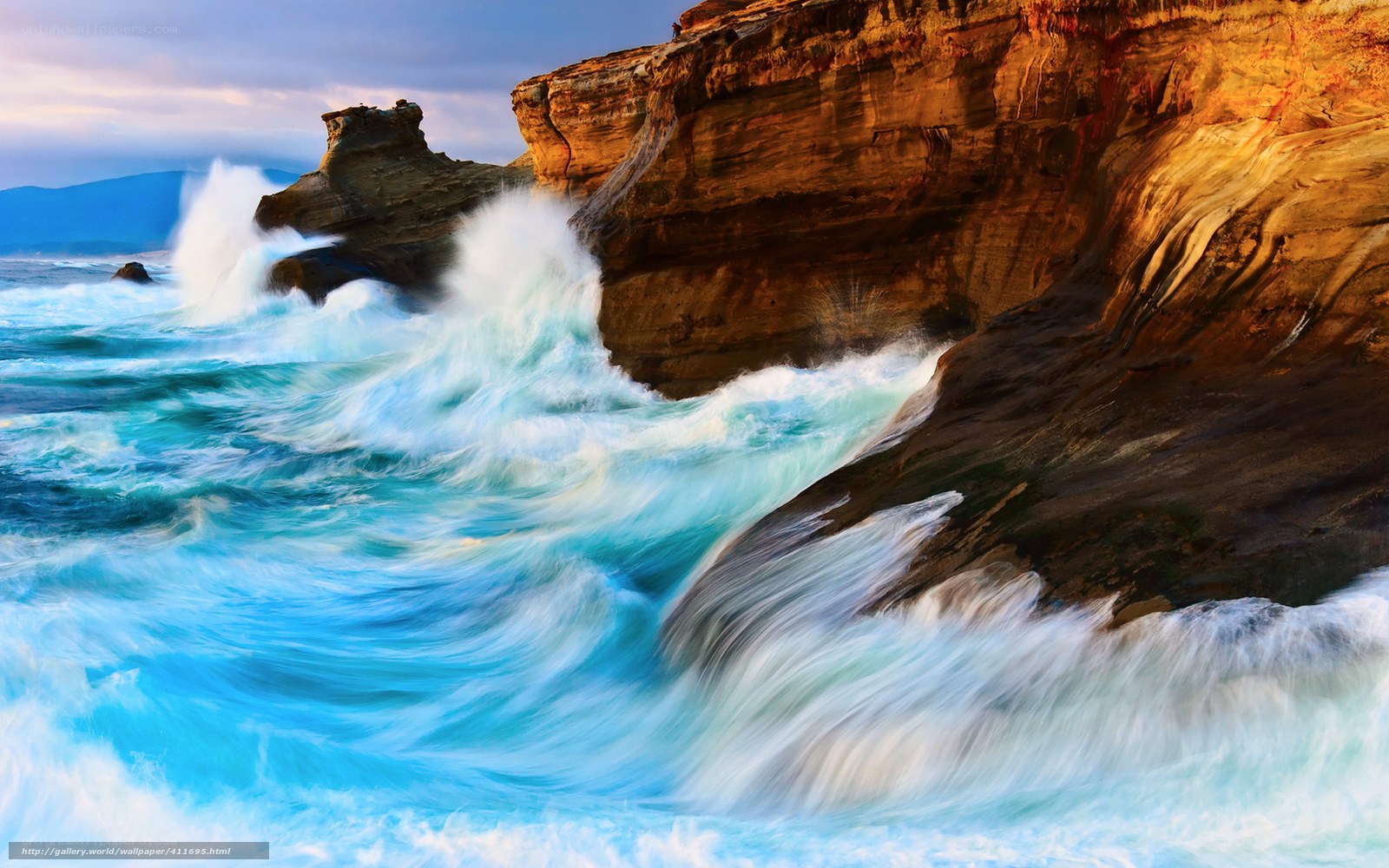 Ocean waves crashing on cliffs