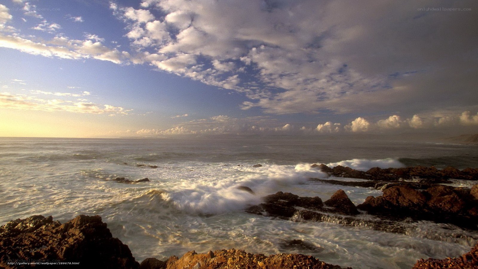 Ocean waves crashing on rocks