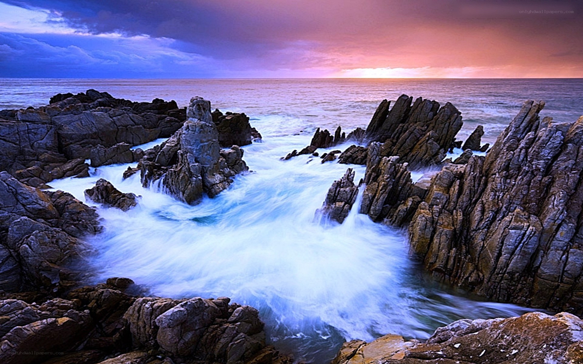 Ocean waves crashing on rocks