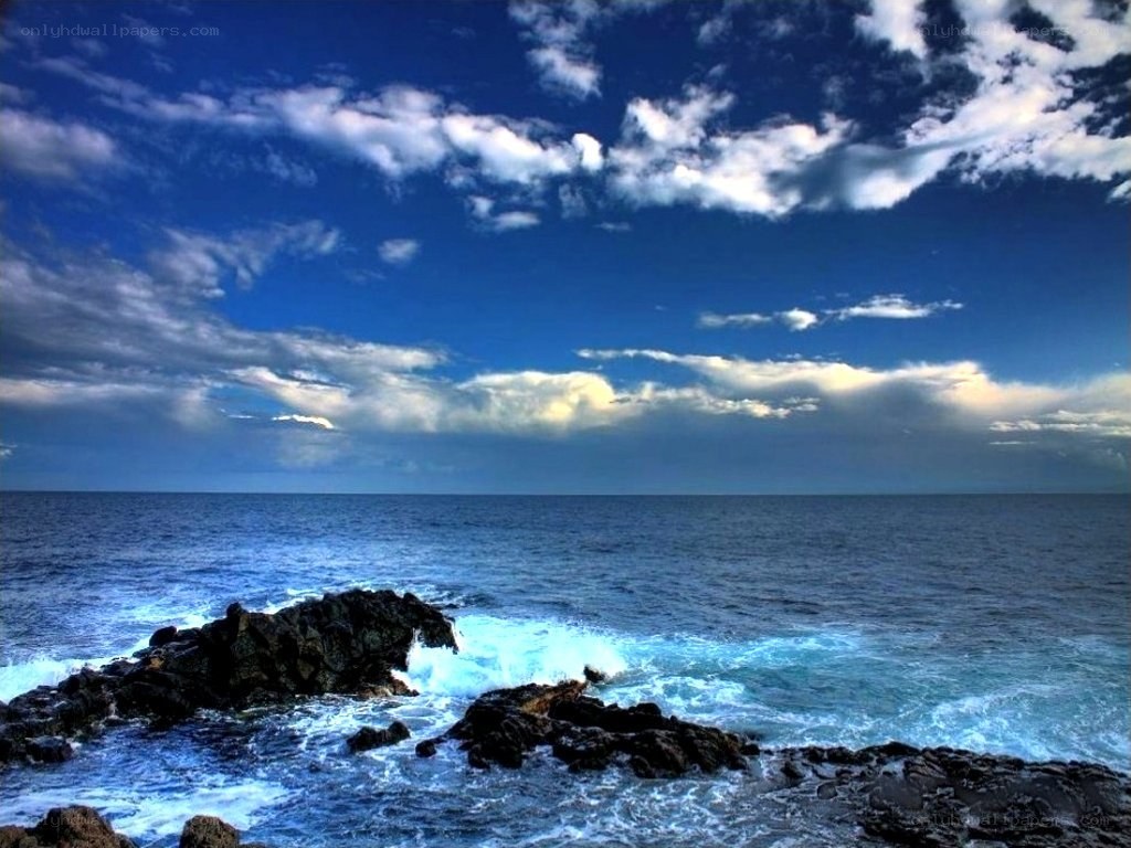 Ocean waves crashing on rocks