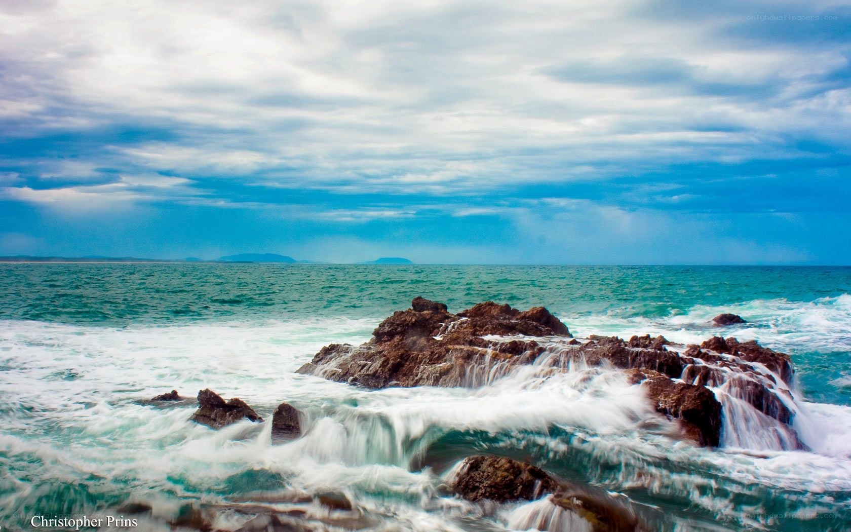 Ocean waves crashing on rocks