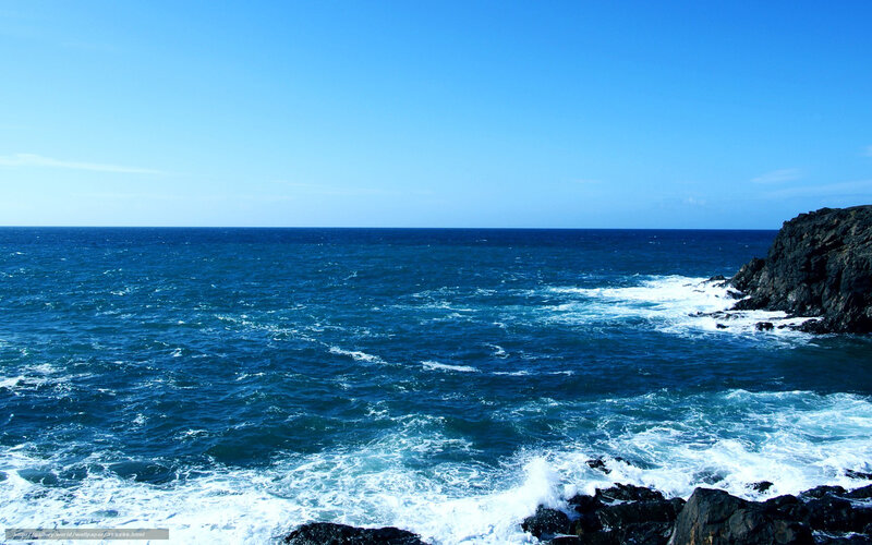 Ocean waves crashing on rocks