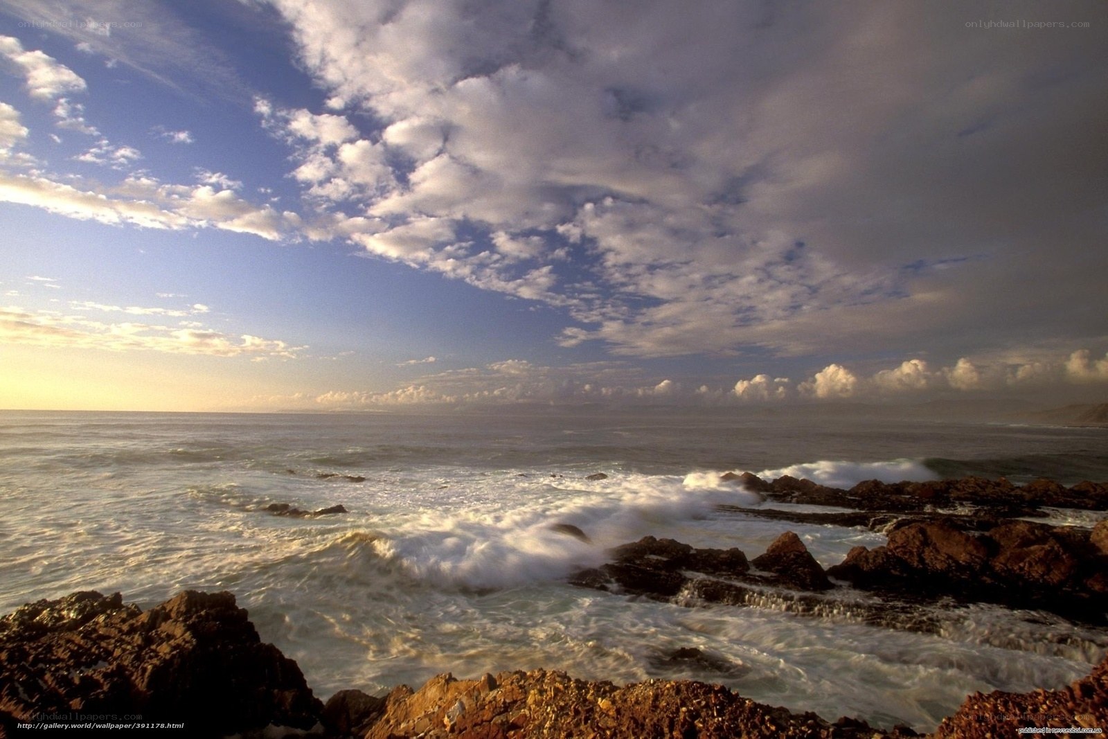Ocean waves crashing on rocks