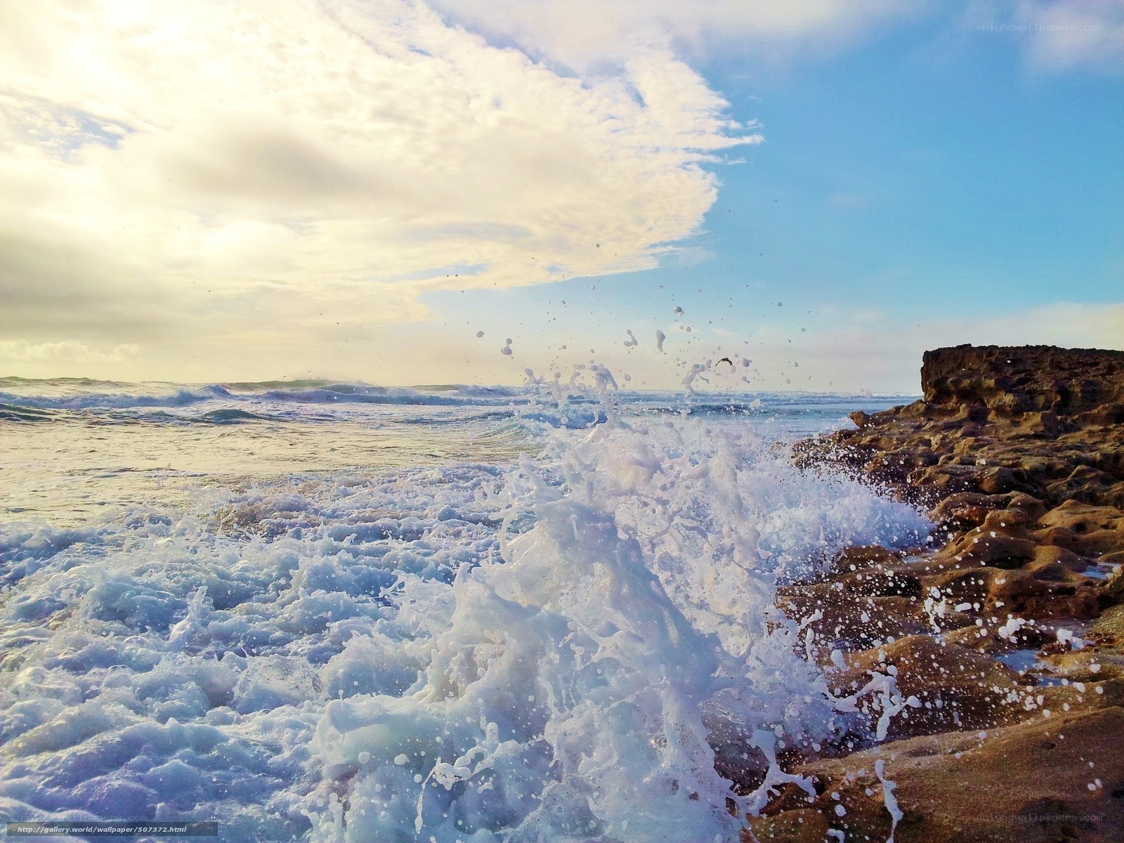 Ocean waves crashing on rocks