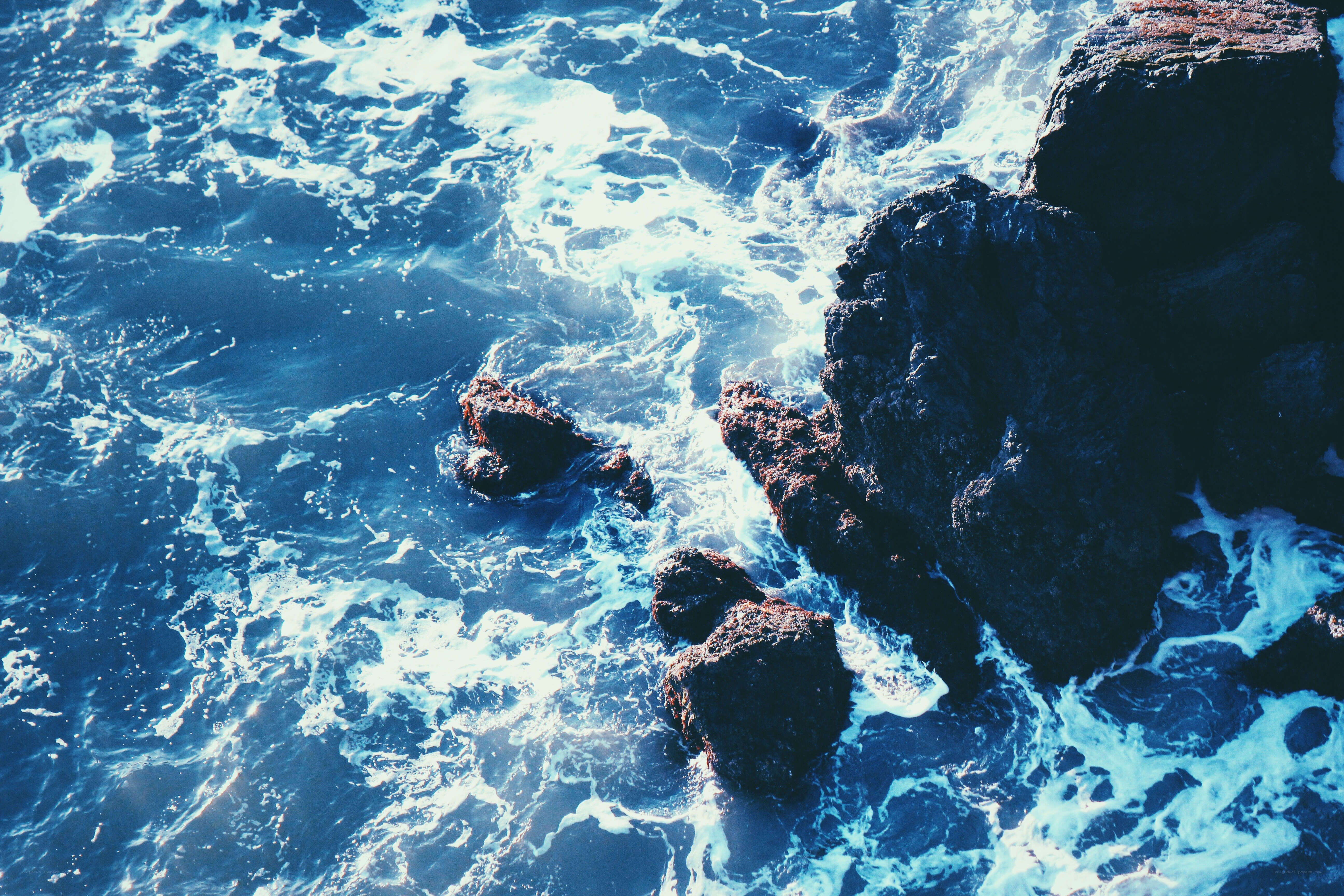Ocean waves crashing on rocks