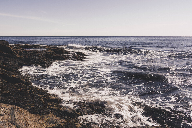 Ocean waves crashing on rocks