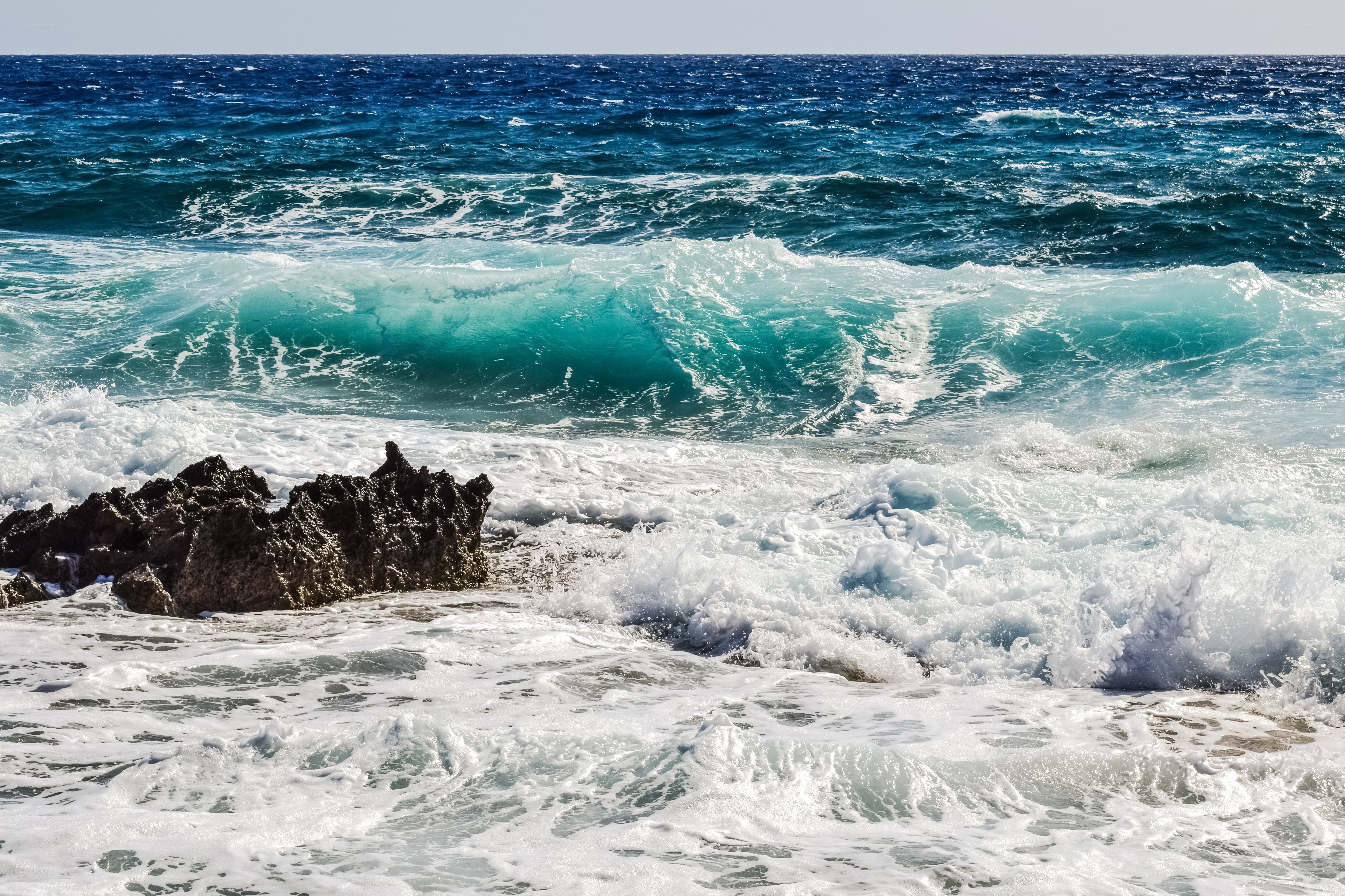 Ocean waves crashing on rocks