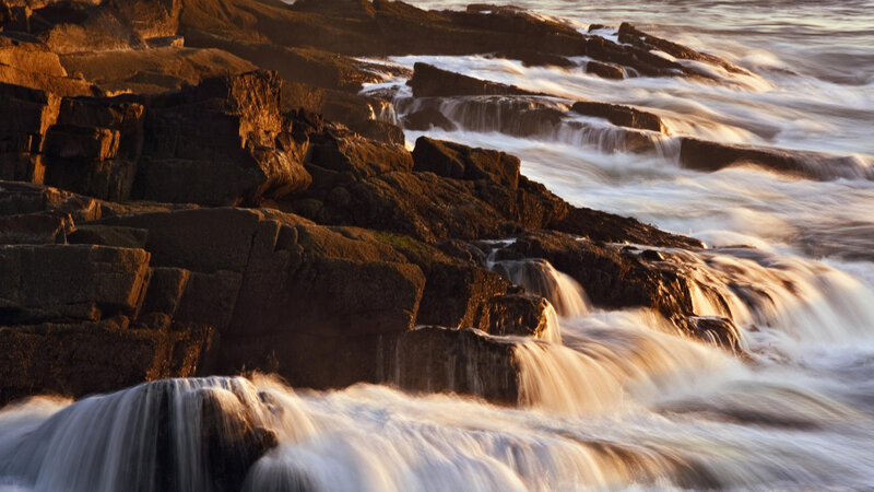Ocean waves crashing on rocks