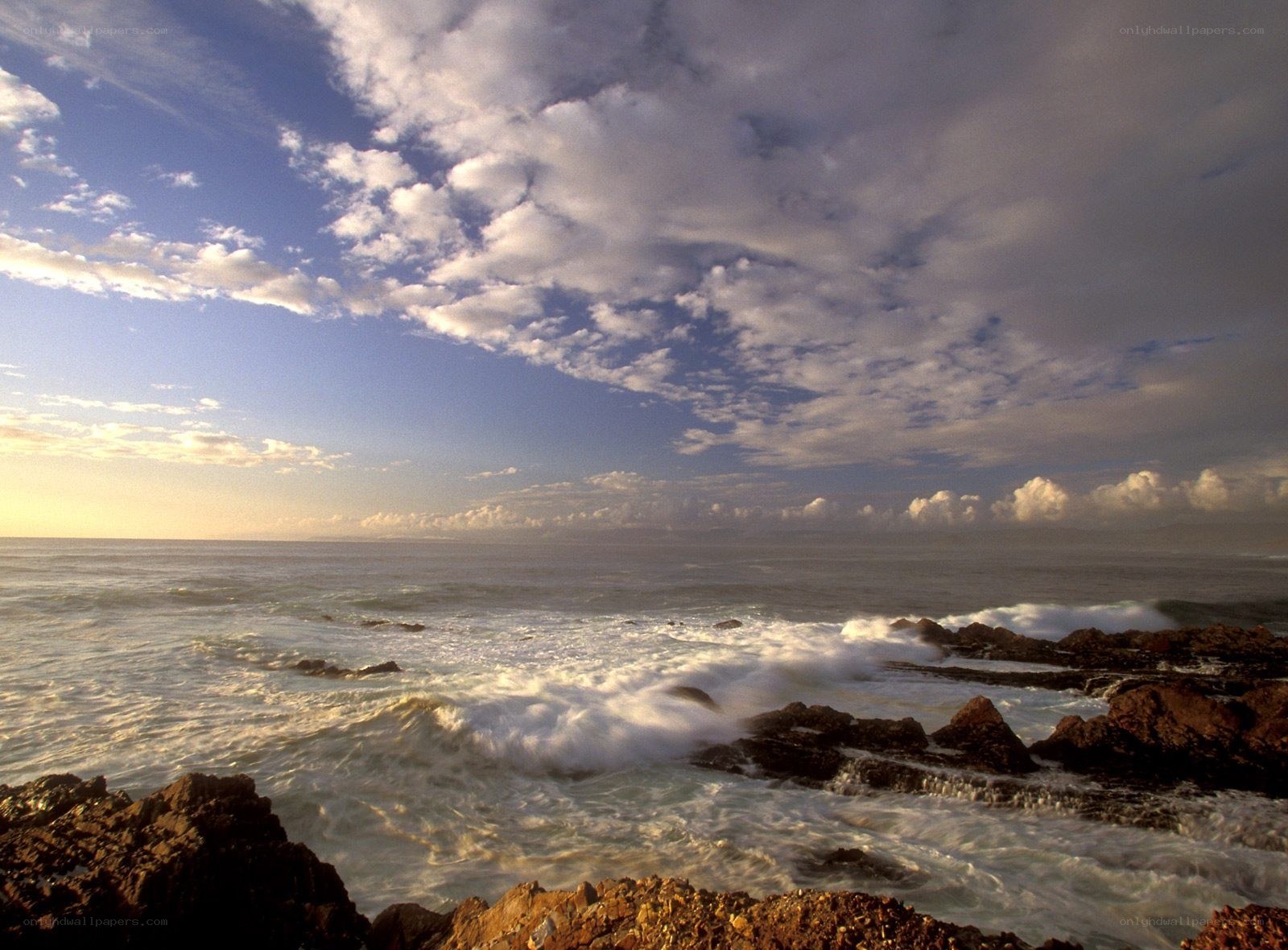 Ocean waves crashing on rocks