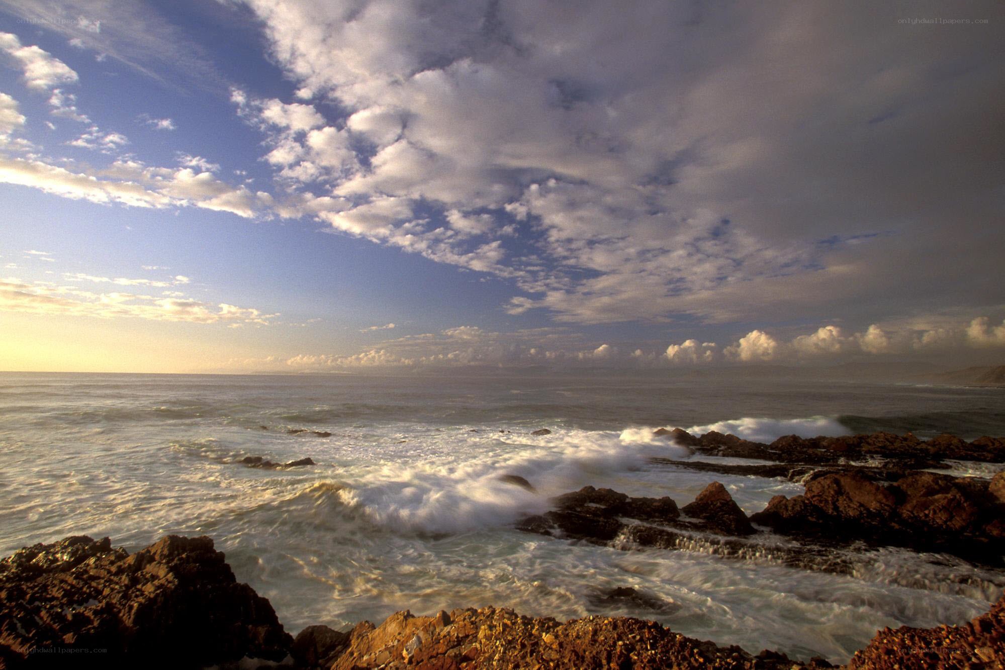 Ocean waves crashing on rocks