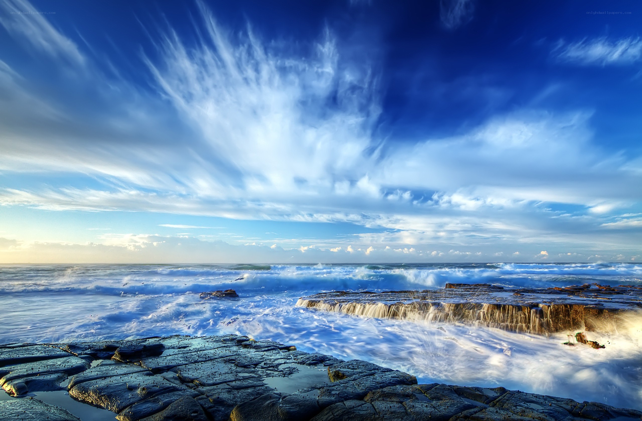 Ocean waves crashing on rocks