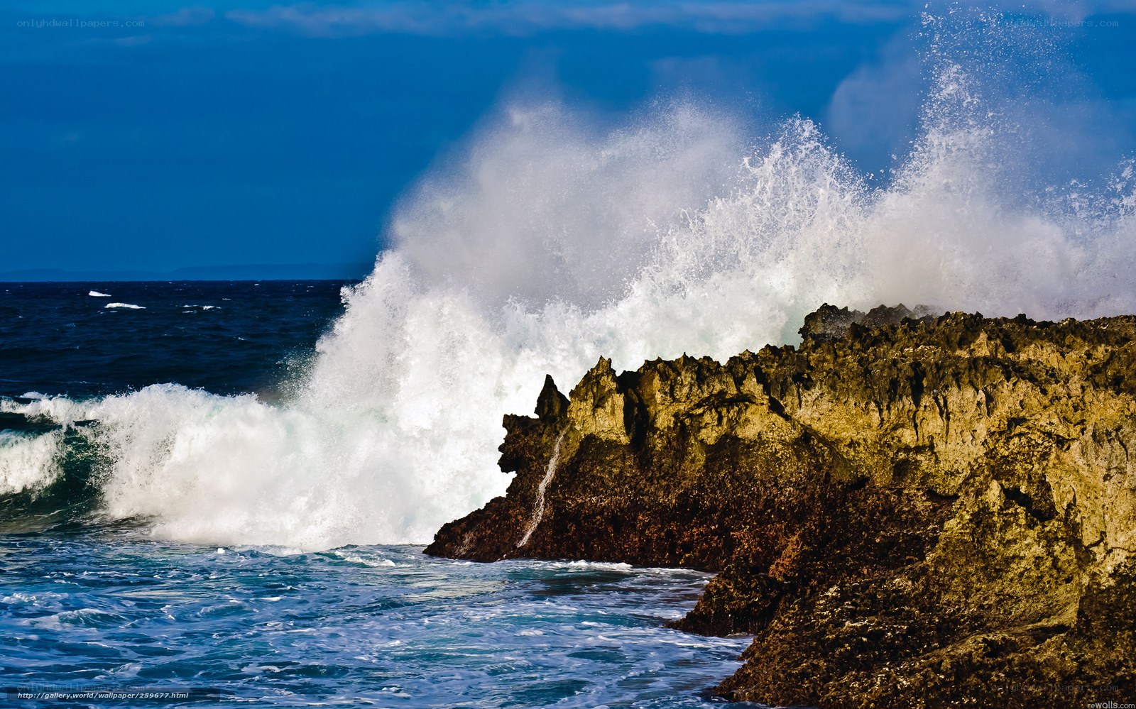 Ocean waves crashing on rocks