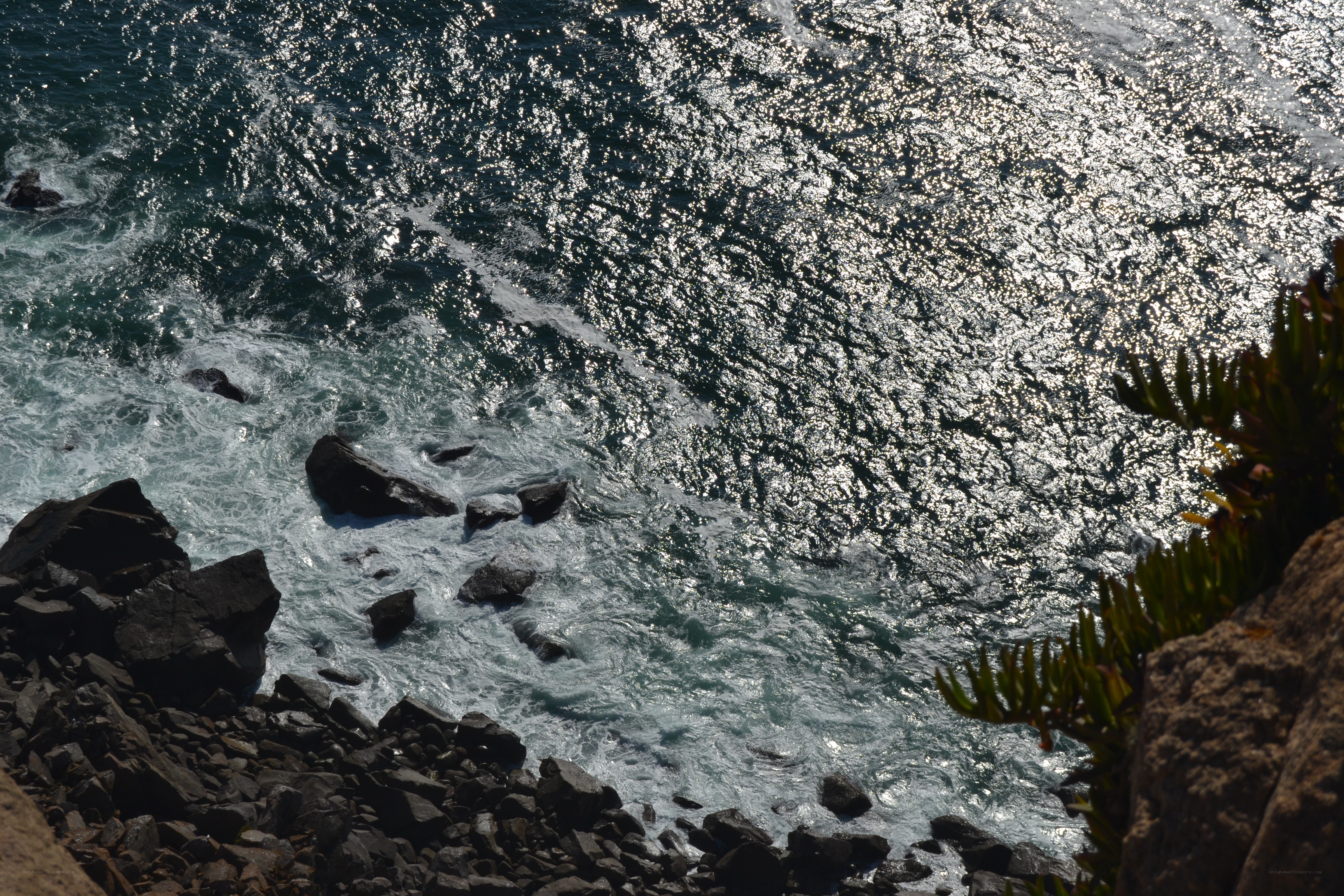 Ocean waves crashing on rocks